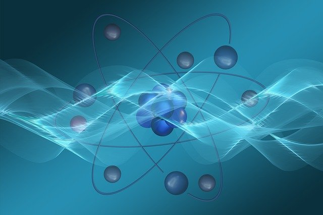 Atomen op een blauwe achtergrond - de overeenkomsten tussen de 3 Principes en kwantumfysica